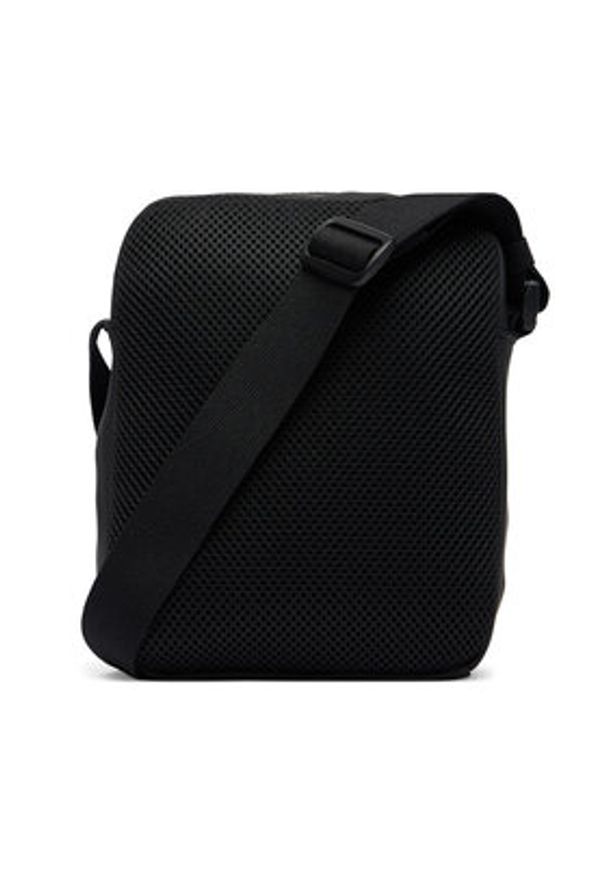 Tommy Jeans Saszetka Tjm Daily Elevated Reporter AM0AM14214 Czarny. Kolor: czarny. Materiał: skóra