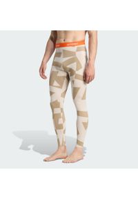 Adidas - Legginsy bazowe Multi Synthetic Base Layer. Kolor: beżowy. Technologia: ClimaCool (Adidas). Sezon: lato. Sport: turystyka piesza #1