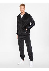 TOMMY HILFIGER - Tommy Hilfiger Spodnie dresowe UM0UM03014 Czarny Regular Fit. Kolor: czarny. Materiał: bawełna, syntetyk #3