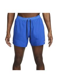 Spodnie treningowe męskie Nike Drifit Stride. Kolor: niebieski. Długość: krótkie. Sport: fitness