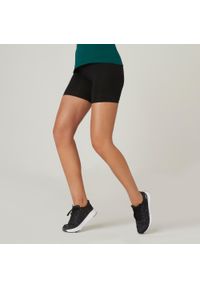 DOMYOS - Spodenki fitness damskie Nyamba Fit+ Slim. Kolor: czarny. Materiał: materiał, elastan, bawełna. Sport: fitness #1