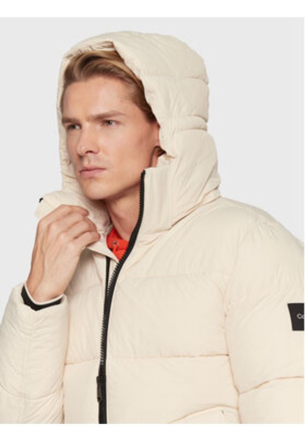 Calvin Klein Kurtka zimowa Crinkle K10K110336 Beżowy Regular Fit. Kolor: beżowy. Materiał: syntetyk. Sezon: zima