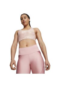 Puma - Stanik fitness PUMA Mid Impact 4Keeps Graphic PM. Kolor: różowy. Sport: fitness