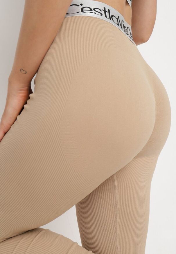 Born2be - Beżowe Elastyczne Legginsy z Szeroką Gumą w Pasie Rindama. Kolor: beżowy. Materiał: guma. Styl: sportowy