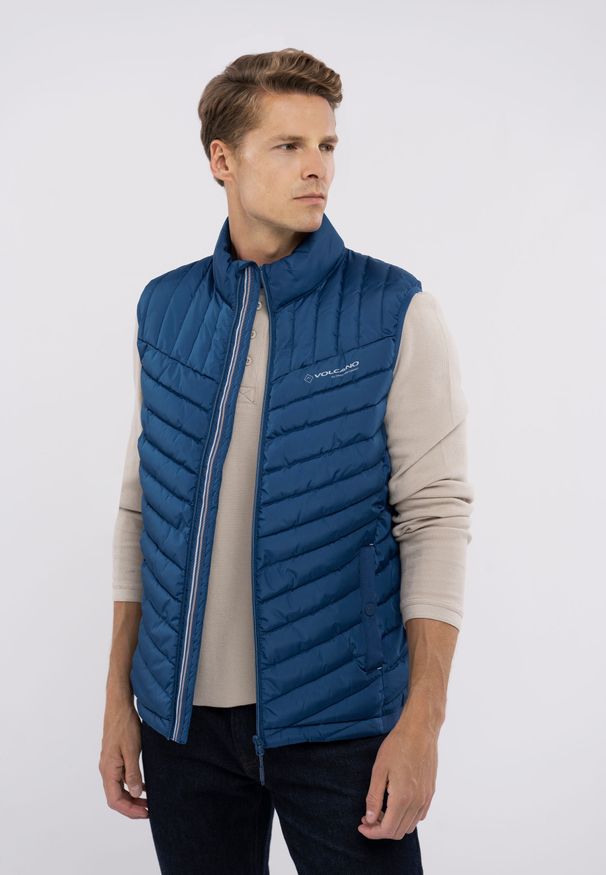 Volcano - Pikowany bezrękawnik V-ALY. Typ kołnierza: kołnierzyk stójkowy. Kolor: niebieski. Materiał: softshell, materiał, włókno, dzianina, syntetyk, polar. Długość rękawa: bez rękawów. Wzór: kolorowy. Styl: klasyczny