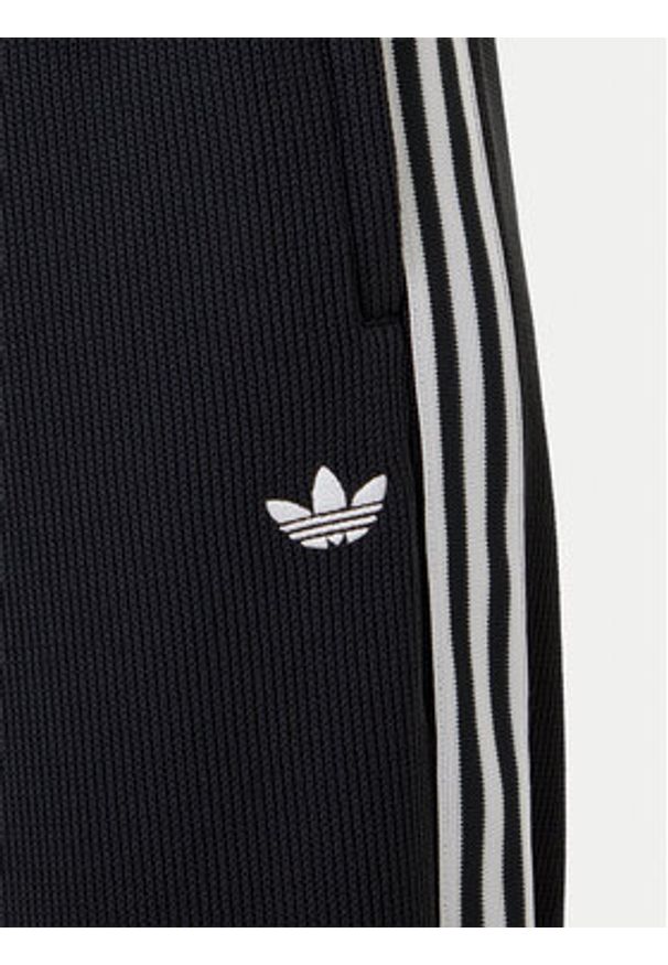 Adidas - adidas Spodnie dresowe adicolor Firebird JV7525 Czarny Regular Fit. Kolor: czarny. Materiał: syntetyk