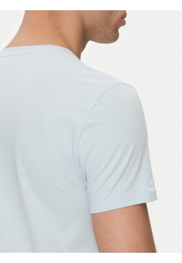 Lacoste T-Shirt TH6709 Błękitny Regular Fit. Kolor: niebieski. Materiał: bawełna