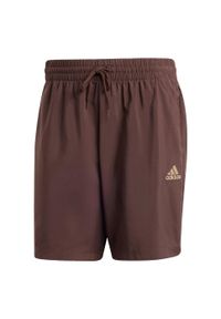 Adidas - AEROREADY Essentials Chelsea Small Logo Shorts. Kolor: brązowy. Materiał: materiał