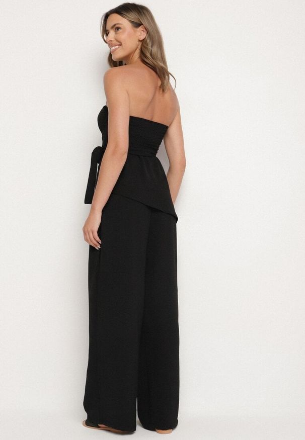 Born2be - Czarny Komplet Bluzka z Asymetrycznym Dołem i Szerokie Spodnie Ralavinea. Kolor: czarny