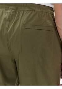 New Balance Spodnie dresowe MP41575 Zielony Regular Fit. Kolor: zielony. Materiał: bawełna #2
