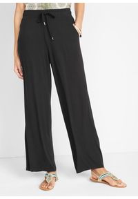 bonprix - Spodnie z dżerseju z lejącej mieszanki wiskozy. Kolor: czarny. Materiał: jersey, wiskoza #1