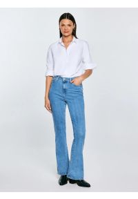 Big-Star - Jeansy damskie z rozszerzaną nogawką jasnoniebieskie Clara Flare 158. Okazja: na co dzień. Kolor: niebieski. Styl: klasyczny, elegancki, retro, casual