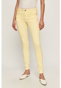 Guess - Spodnie. Kolor: żółty. Materiał: tkanina, bawełna, materiał, elastan. Wzór: gładki #1