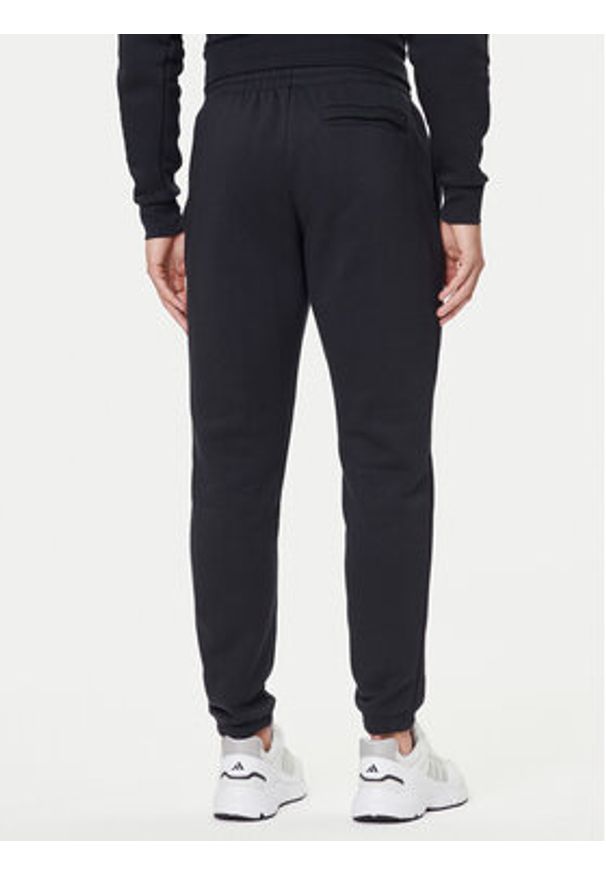 Under Armour Spodnie dresowe UA Essential Fleece Jogger 1373882 Czarny Regular Fit. Kolor: czarny. Materiał: bawełna
