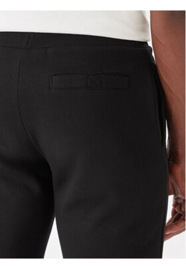 Nautica Spodnie dresowe Nampa N1T04063 Czarny Regular Fit. Kolor: czarny. Materiał: bawełna, syntetyk