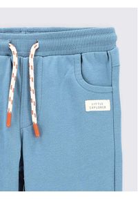 COCCODRILLO - Coccodrillo Spodnie dresowe ZC2120101TRN Błękitny Regular Fit. Kolor: niebieski. Materiał: bawełna