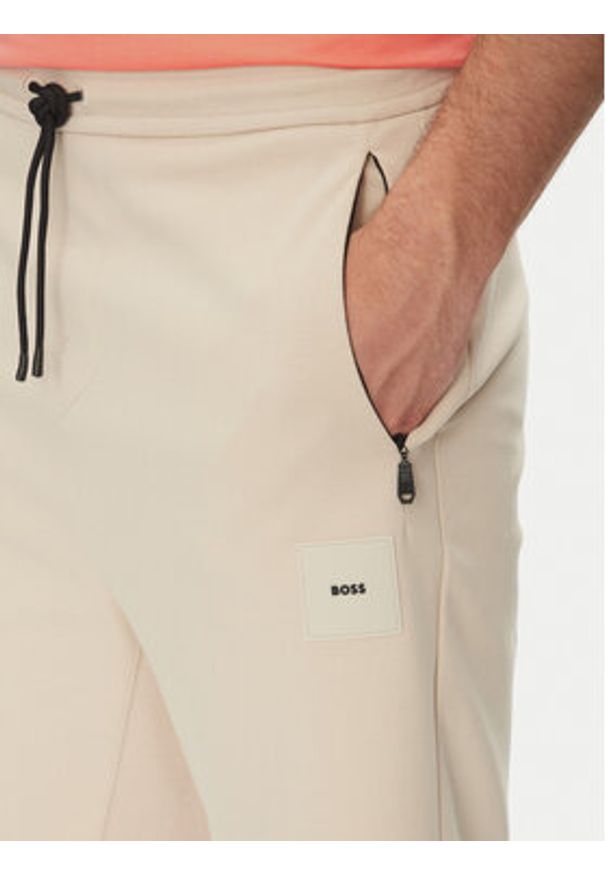 BOSS Szorty sportowe Headlo 50537199 Beżowy Regular Fit. Kolor: beżowy. Materiał: bawełna. Styl: sportowy