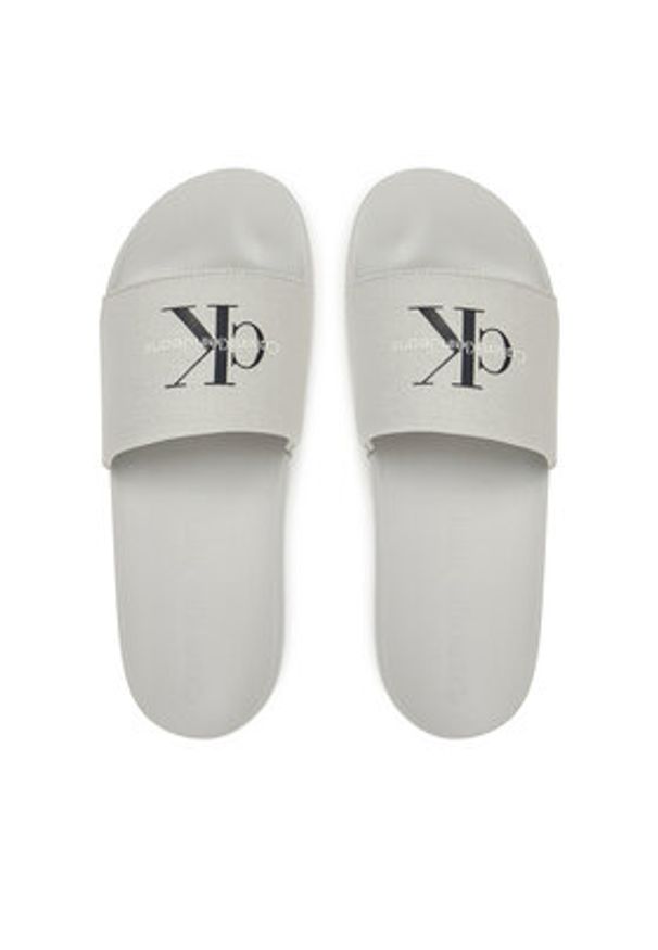 Calvin Klein Jeans Klapki Slide Monogram Cv YM0YM01271 Szary. Kolor: szary. Materiał: materiał