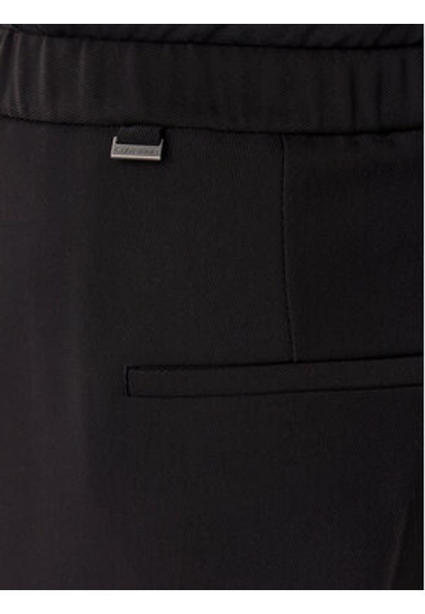 Calvin Klein Spodnie materiałowe Travel Twill K20K208214 Czarny Wide Leg. Kolor: czarny. Materiał: syntetyk