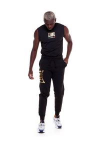 LEONE 1947 APPAREL - Męskie spodnie dresowe w kolorze złotym. Kolor: czarny. Materiał: dresówka. Sport: fitness #2