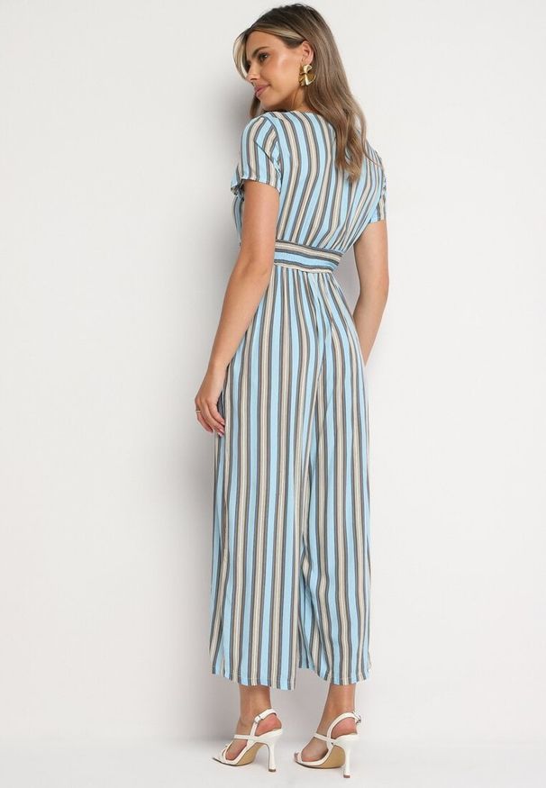 Born2be - Niebieski Wiskozowy Kombinezon z Guzikami przy Dekolcie i Elastyczną Gumką w Talii Tinaleias. Okazja: na co dzień, do pracy. Kolor: niebieski. Materiał: wiskoza. Długość: długie. Wzór: aplikacja. Styl: casual, klasyczny