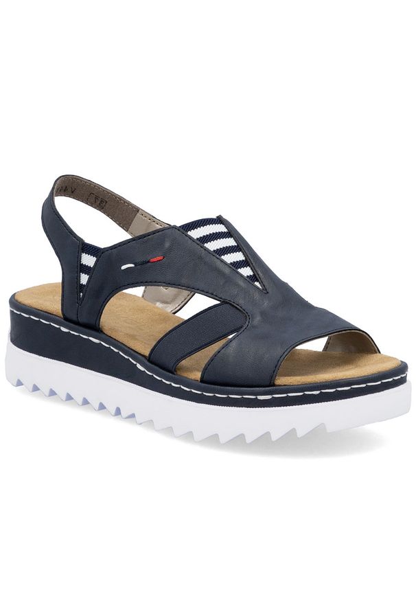 Sandały damskie na koturnie wsuwane granatowe Rieker V44Y5-14. Zapięcie: bez zapięcia. Kolor: niebieski. Materiał: skóra ekologiczna. Obcas: na koturnie