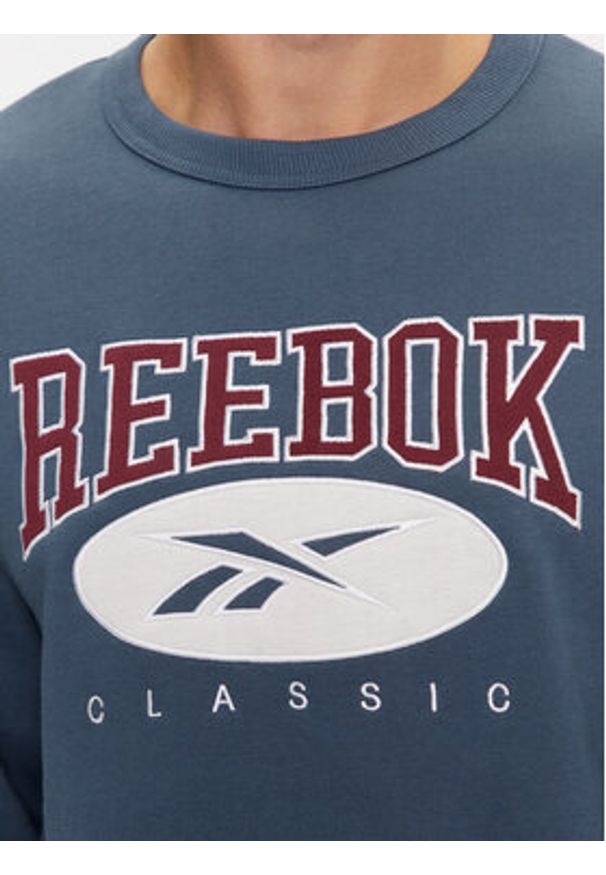 Reebok Bluza Archive Essentials IM1531 Niebieski Regular Fit. Kolor: niebieski. Materiał: bawełna, syntetyk