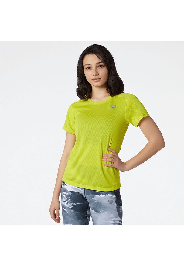 Koszulka New Balance WT01234SYR – żółta. Kolor: żółty. Materiał: materiał, poliester. Sezon: lato. Sport: fitness