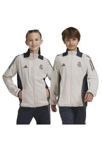 Adidas - Dziecięca bluza dresowa Real Madrid 2024/25. Kolor: różowy. Materiał: dresówka. Sport: piłka nożna