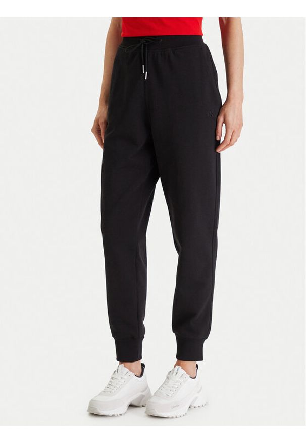 Calvin Klein Jeans Spodnie dresowe Archive Logo LV047E236G Czarny Slim Fit. Kolor: czarny. Materiał: bawełna