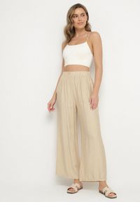 Born2be - Beżowe Szerokie Spodnie Typu Palazzo z Wysokim Stanem Varlevi. Okazja: na co dzień. Stan: podwyższony. Kolor: beżowy. Styl: elegancki, casual #6