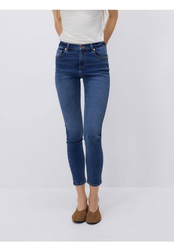 Reserved - Jeansy slim push up - niebieski. Kolor: niebieski