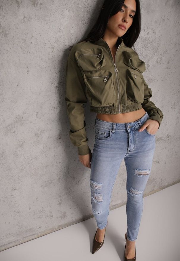 Renee - Niebieskie Jeansy Slim z Bawełny Ozdobione Przetarciami Vikiania. Okazja: na co dzień. Kolor: niebieski. Wzór: aplikacja. Styl: casual