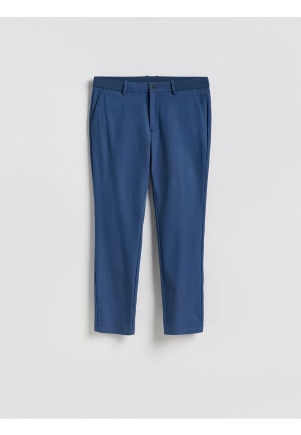 Reserved - Spodnie chino slim fit - niebieski. Kolor: niebieski. Materiał: tkanina, wiskoza