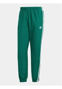 Adidas - adidas Spodnie dresowe Adicolor Woven Firebird IT2497 Zielony Regular Fit. Kolor: zielony. Materiał: syntetyk #6