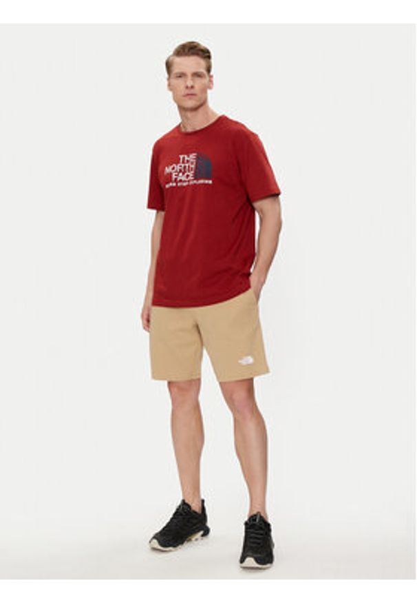 The North Face Szorty sportowe Graphic NF0A3S4F Beżowy Regular Fit. Kolor: beżowy. Materiał: bawełna. Styl: sportowy