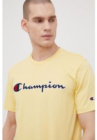 Champion t-shirt bawełniany kolor żółty z aplikacją. Kolor: żółty. Materiał: bawełna. Wzór: aplikacja