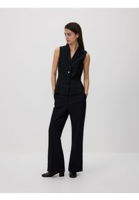 Reserved - Spodnie z rozcięciami - czarny. Kolor: czarny. Materiał: tkanina, wiskoza