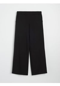 Sinsay - Spodnie dresowe z szerokimi nogawkami soft touch - czarny. Kolor: czarny. Materiał: dresówka