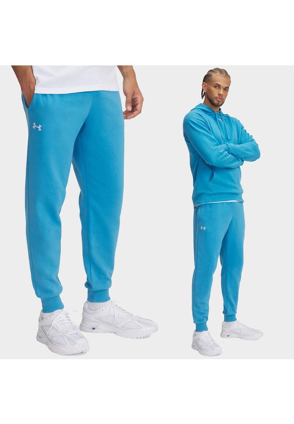 Spodnie dresowe męskie Under Armour joggery. Kolor: niebieski. Materiał: dresówka. Sport: fitness