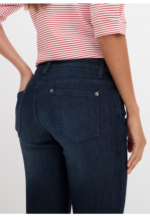 bonprix - Dżinsy o kroju bootcut, mid waist, ze stretchem. Kolor: niebieski