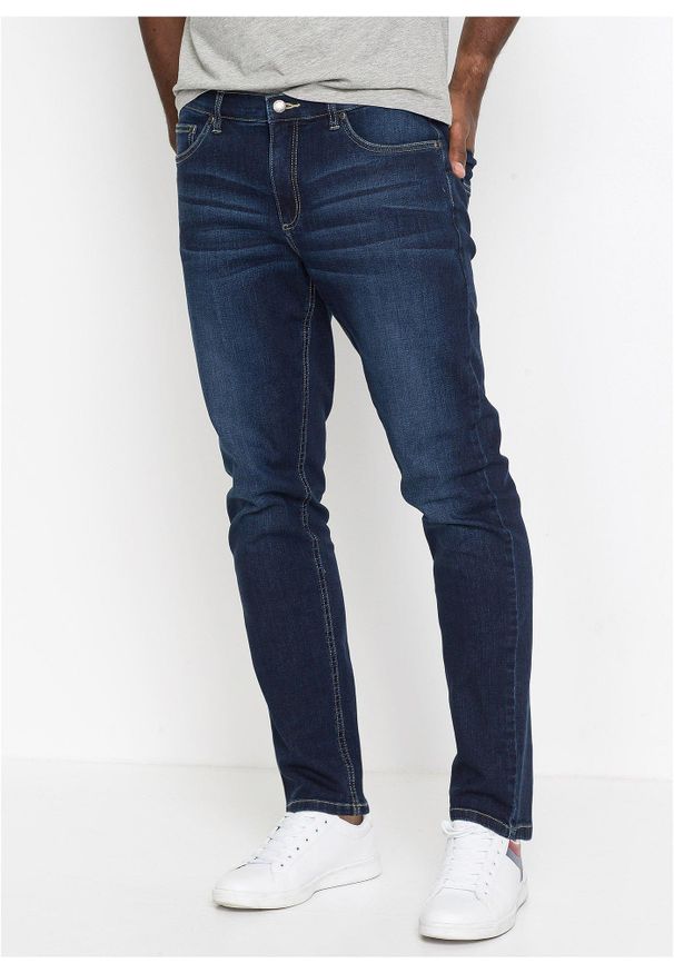 bonprix - Dżinsy regular fit, z rozszerzanym nogawkami. Kolor: niebieski. Styl: elegancki, klasyczny
