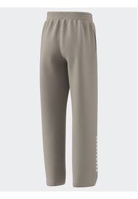 Adidas - adidas Spodnie dresowe IB3234 Beżowy Loose Fit. Kolor: beżowy. Materiał: bawełna #3