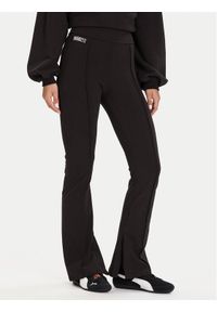 Puma Spodnie dresowe PUMA X ROSÉ 635156 01 Czarny Slim Fit. Kolor: czarny. Materiał: bawełna