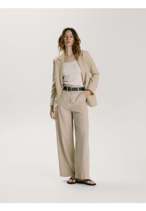 Reserved - Spodnie z modalem - beżowy. Kolor: beżowy. Materiał: tkanina