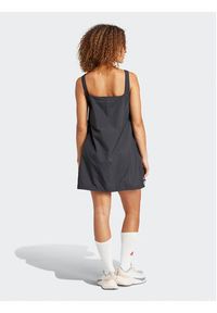 Adidas - adidas Sukienka letnia City Escape IQ4823 Czarny Loose Fit. Kolor: czarny. Materiał: syntetyk. Sezon: lato #3