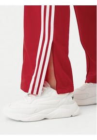 Adidas - adidas Spodnie dresowe adicolor Classics Firebird IR8081 Czerwony Regular Fit. Kolor: czerwony. Materiał: syntetyk #4