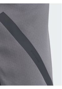 Adidas - adidas Spodnie materiałowe Z.N.E. OPEN HEMZ.N.E. OPEN HEM Szary Loose Fit. Kolor: szary. Materiał: materiał #2