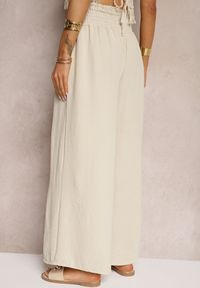 Renee - Beżowe Spodnie High Waist z Szerokimi Nogawkami i Gumką w Pasie Risabessa. Okazja: na co dzień. Stan: podwyższony. Kolor: beżowy. Styl: elegancki, casual