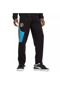 Puma - Spodnie dresowe Manchester City 2024/25. Kolor: wielokolorowy, niebieski, czarny. Materiał: dresówka. Styl: elegancki #1